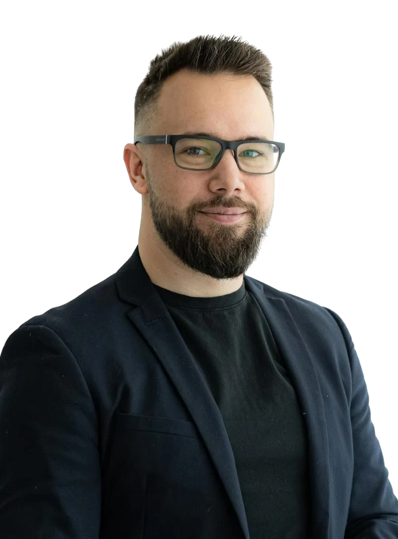 man standing near white wall