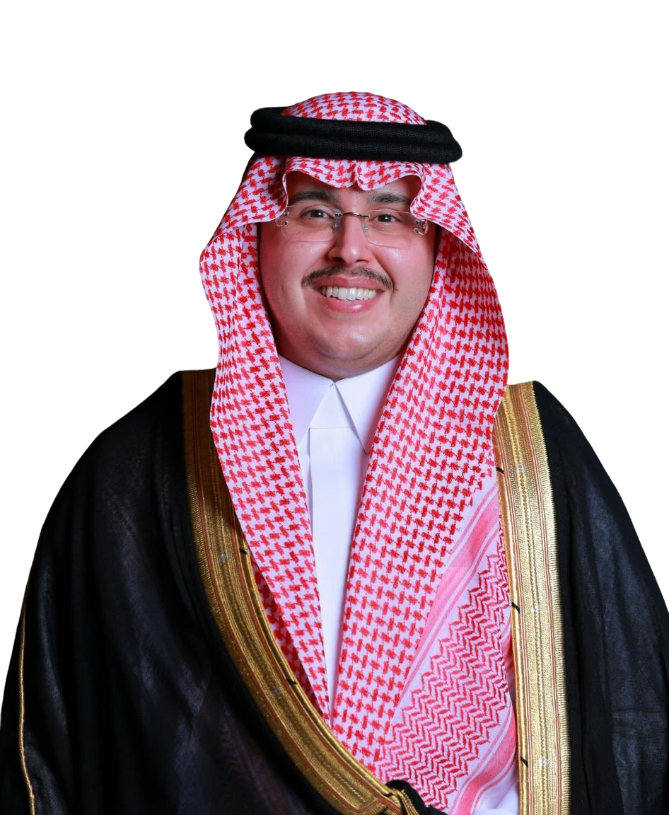 A man in a suit smoking a cigarette